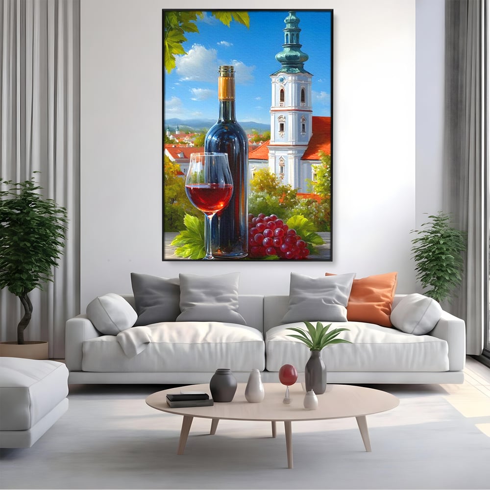 Tablou canvas cu pictura cu sticla de vin si manastire, in rama de aluminiu negru, pe perete intr-un living
